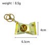 SKU_04_梦龙零食袋黄色-金扣 Miniature Magnum branded Ice cream Gashapon Keychain